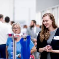 Students looking at a project